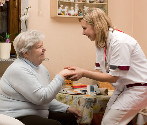 a pharmacy technician assists a patient